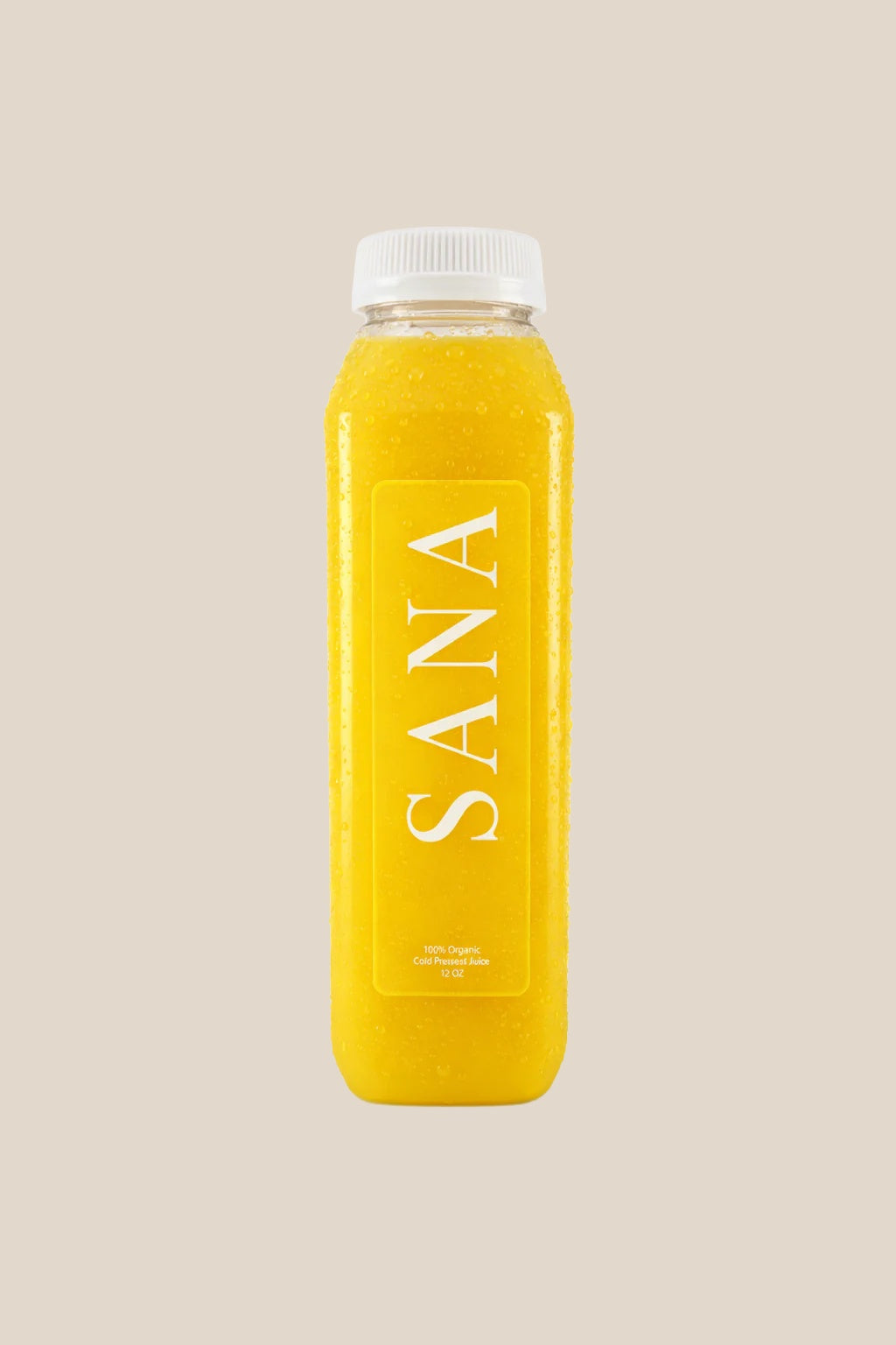 Bottle of Golden Hour Juice, organic cold-pressed orange, pineapple, ginger and lemon juice by SANA Wellness Bar, Orlando