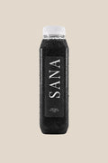 Bottle of VANTA SOL Juice, jet-black organic cold-pressed apple, lemon and activated charcoal juice by SANA Wellness Bar
