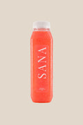 Bottle of Pink Punch Juice, organic cold-pressed strawberry, pineapple, apple and lemon juice by SANA Wellness Bar, Orlando