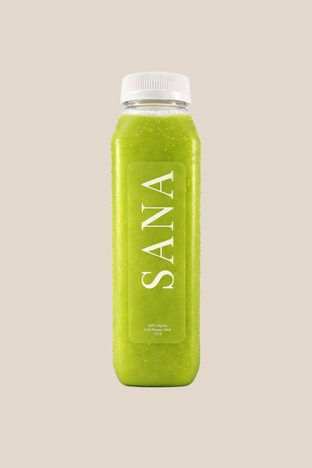 Bottle of Tropical Green Juice, organic cold-pressed pineapple, kale and lime juice by SANA Wellness Bar, Orlando