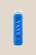 Bottle of Shark Juice, organic cold-pressed apple, pineapple, citrus and blue spirulina juice by SANA Wellness Bar, Orlando