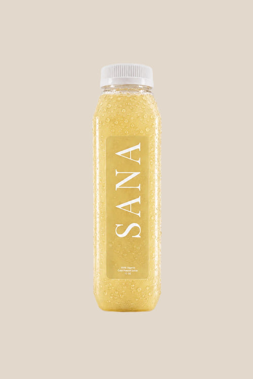 Bottle of EL DORADO Juice, organic cold-pressed orange, pineapple and apple juice by SANA Wellness Bar, Orlando